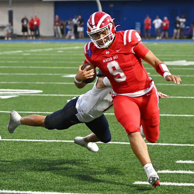 Mater Dei quarterback Dash Beierly carries the ball up the sideline against Bishop Gorman.