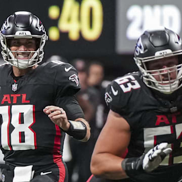 Sep 8, 2024; Atlanta, Georgia, USA; Atlanta Falcons quarterback Kirk Cousins (18) passes against the Pittsburgh Steelers during the first quarter at Mercedes-Benz Stadium. 