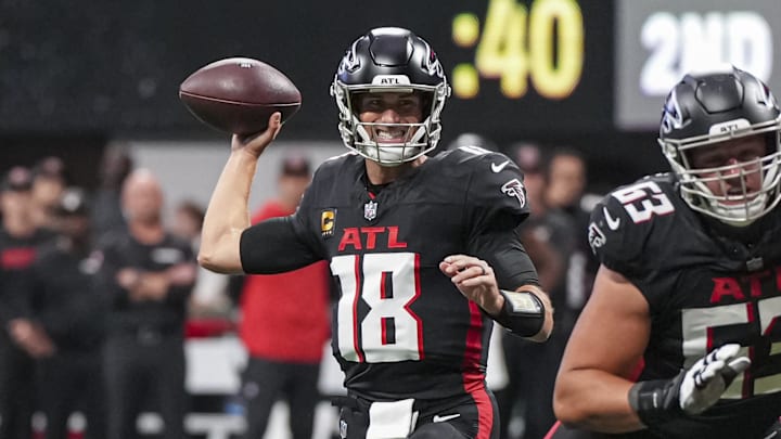 Sep 8, 2024; Atlanta, Georgia, USA; Atlanta Falcons quarterback Kirk Cousins (18) passes against the Pittsburgh Steelers during the first quarter at Mercedes-Benz Stadium. 