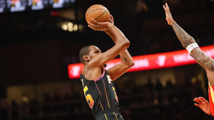 Feb 2, 2024; Atlanta, Georgia, USA; Phoenix Suns forward Kevin Durant (35) shoots against the