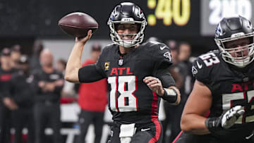 Sep 8, 2024; Atlanta, Georgia, USA; Atlanta Falcons quarterback Kirk Cousins (18) passes against the Pittsburgh Steelers during the first quarter at Mercedes-Benz Stadium. Mandatory Credit: Dale Zanine-Imagn Images
