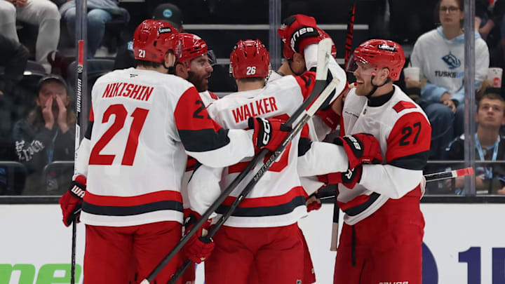 Apr 11, 2026; Salt Lake City, Utah, USA; Carolina Hurricanes center Jordan Staal (11) celebrates with teammates after scoring a goal against the Utah Mammoth during the first period at Delta Center. Mandatory Credit: Rob Gray-Imagn Images