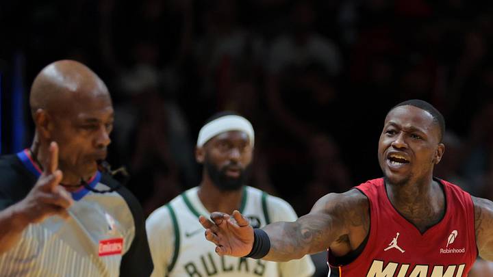 Nov 26, 2024; Miami, Florida, USA; Miami Heat guard Terry Rozier (2) reacts toward referee Tom Washington (49) after shooting the basketball against the Milwaukee Bucks during the fourth quarter at Kaseya Center. Mandatory Credit: Sam Navarro-Imagn Images