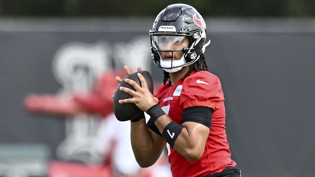 Houston Texans quarterback C.J. Stroud (7) participates in a drill during an NFL football minicamp at NRG Stadium. 