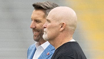 Washington Commanders general manager Adam Peters and head coach Dan Quinn