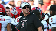 Sep 20, 2025; Durham, North Carolina, USA;  NC State Wolfpack head coach Dave Doeren during the second quarter against the Duke Blue Devils at Wallace Wade Stadium. Mandatory Credit: Zachary Taft-Imagn Images