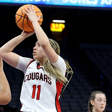 Carondelet junior Oliva Smith goes up for a deuce in a 51-48 win over Sage Hill for the CIF State Division 1 championship Friday at the Golden 1 Center. 