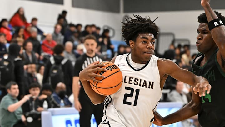 Salesian's Carlton Perrilliat (21) goes baseball en route to his 20 point night in a loss to St. Joseph Santa Maria last month. On Wednesday, he led the Pride with 19 points in a 66-53 win over Modesto Christian at Albany High School. Salesian's Carlton Perrilliat (21) goes baseball en route to his 20 point night in a loss to St. Joseph Santa Maria last month. On Wednesday, he led the Pride with 19 points in a 66-53 win over Modesto Christian at Albany High School.