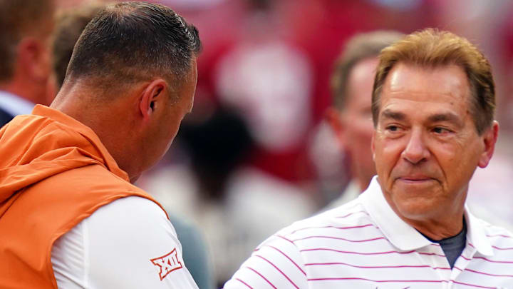 Sep 9, 2023; Tuscaloosa, Alabama, USA; Texas Longhorns head coach Steve Sarkisian greets Alabama Crimson Tide head coach Nick Saban midfield before their game at Bryant-Denny Stadium. Mandatory Credit: John David Mercer-Imagn Images