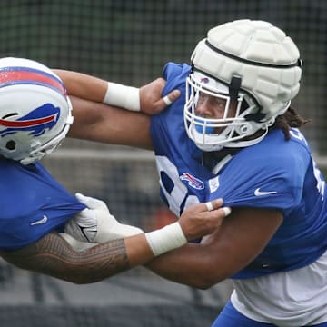 Bills defensive tackle T.J. Sanders works to get past A.J. Epenesa during position drills during day seven of Buffalo Bills training camp at St. John Fisher University Thursday, July 31, 2025 in Pittsford, NY.