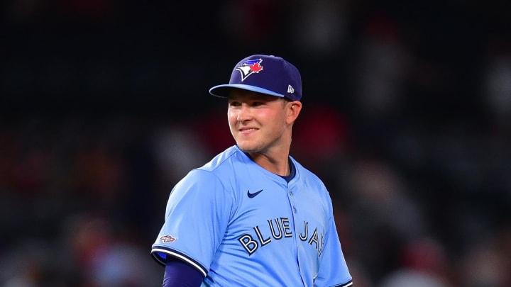 Aug 12, 2024; Anaheim, California, USA; Toronto Blue Jays second baseman Will Wagner (7) celebrates the victory against the Los Angeles Angels at Angel Stadium. Mandatory Credit: Gary A. Vasquez-USA TODAY Sports