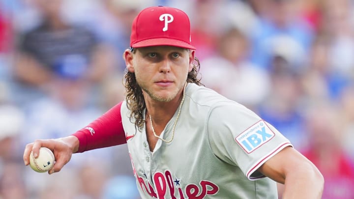 Aug 24, 2024; Kansas City, Missouri, USA; Philadelphia Phillies third baseman Alec Bohm (28) throws to first base during the first inning against the Kansas City Royals at Kauffman Stadium