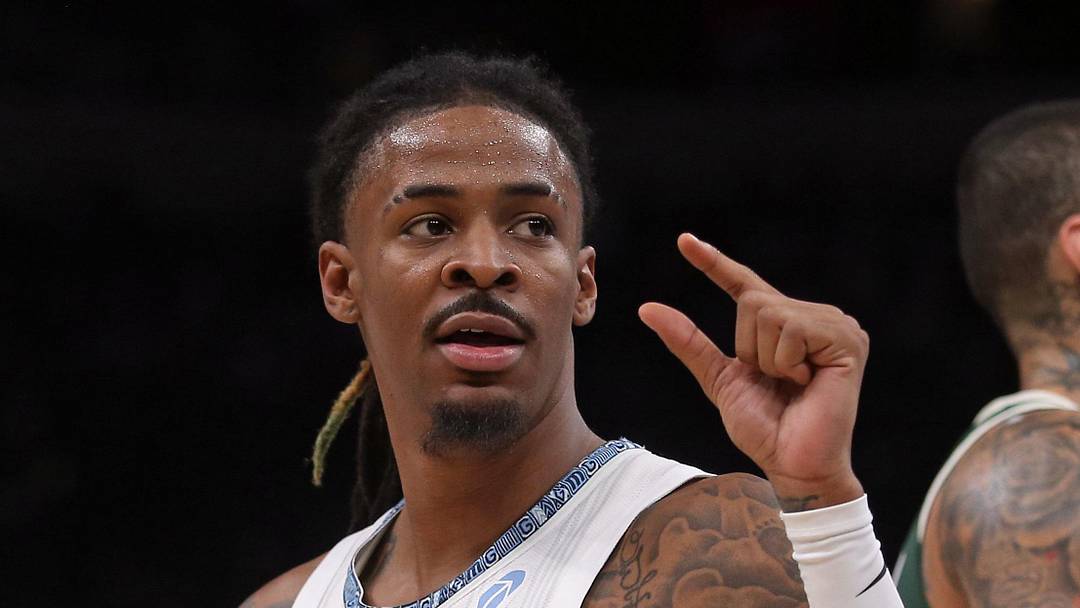 Dec 26, 2025; Memphis, Tennessee, USA; Memphis Grizzlies guard Ja Morant (12) gestures during the third quarter against the Milwaukee Bucks at FedExForum. Mandatory Credit: Petre Thomas-Imagn Images