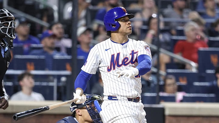 New York Mets right fielder Juan Soto hits a home run. New York Mets right fielder Juan Soto hits a home run.