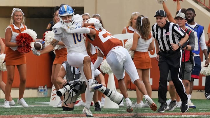 Sep 6, 2025; Austin, Texas, USA; San Jose State Spartans wide receiver Danny Scudero (10) reaches for a pass while defended by Texas Longhorns defensive back Graceson Littleton (29) during the second half at Darrell K Royal-Texas Memorial Stadium. Mandatory Credit: Scott Wachter-Imagn Images