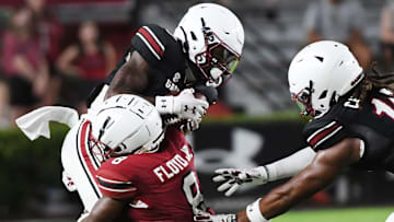 The University of South Carolina Spring football game took place at William-Brice Stadium on April 24, 2024. USC's Mazeo Bennett (3) is hit by Emory Floyd (8) on a play.