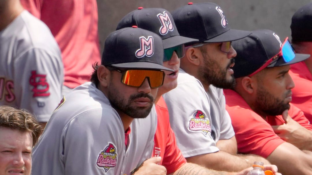July 24, 2024; Columbus, Ohio, USA; 
Memphis Redbirds relief pitcher Jacob Bosiokovic, a Delaware Hayes graduate who played for Ohio State stands in the dugout during a game against the Columbus Clippers. Bosiokovic was called up to the Cardinals earlier this season and is now back in the minors.