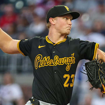 Sep 26, 2025; Cumberland, Georgia, USA; Pittsburgh Pirates pitcher Mitch Keller (23) pitches the ball against the Atlanta Braves during the first inning at Truist Park. Mandatory Credit: Jordan Godfree-Imagn Images