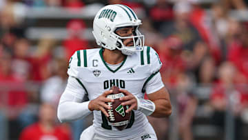 Aug 28, 2025; Piscataway, New Jersey, USA;  Ohio Bobcats quarterback Parker Navarro (13) drops back to pass during the first half against the Rutgers Scarlet Knights at SHI Stadium. Mandatory Credit: Vincent Carchietta-Imagn Images