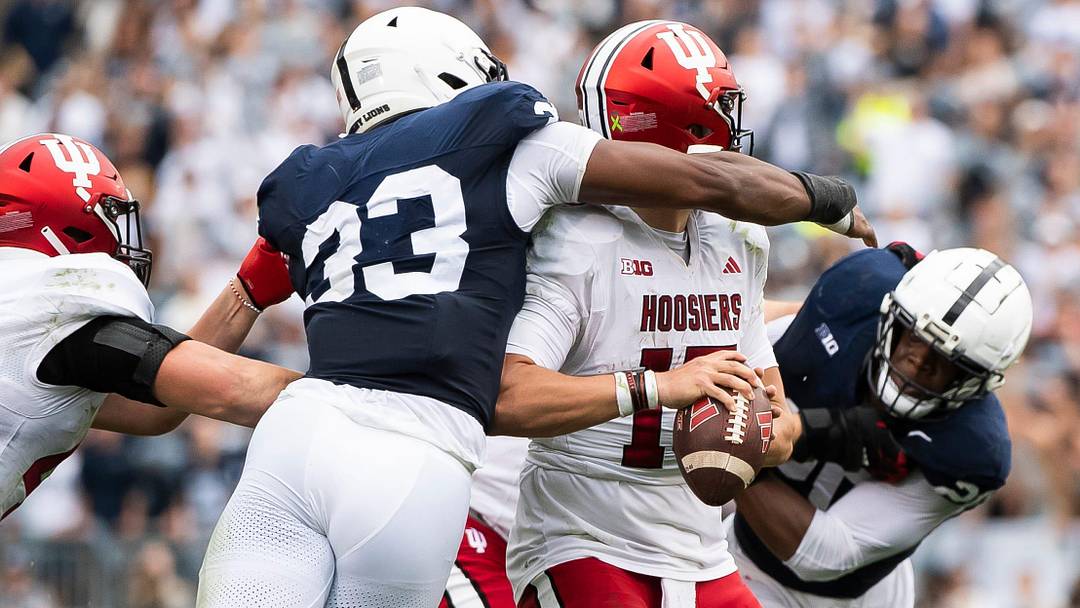 Penn State defensive end Dani Dennis-Sutton (33) prepares to strip-sack Indiana quarterback Brendan Sorsby late in the the second half of an NCAA football game against Indiana at Beaver Stadium Saturday, Oct. 28, 2023, in State College, Pa. The ball ended up going out of the end zone and resulted in a safety.