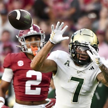 Sep 7, 2024; Tuscaloosa, Alabama, USA;  South Florida Bulls wide receiver Michael Brown-Stephens (7) cannot reach a ball against Alabama Crimson Tide defensive back Zabien Brown (2) during the first half at Bryant-Denny Stadium. Mandatory Credit: Gary Cosby Jr.-Imagn Images