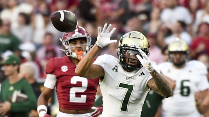 Sep 7, 2024; Tuscaloosa, Alabama, USA;  South Florida Bulls wide receiver Michael Brown-Stephens (7) cannot reach a ball against Alabama Crimson Tide defensive back Zabien Brown (2) during the first half at Bryant-Denny Stadium. Mandatory Credit: Gary Cosby Jr.-Imagn Images