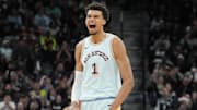 Dec 19, 2024; San Antonio, Texas, USA;  San Antonio Spurs center Victor Wembanyama (1) celebrates in the second half against the Atlanta Hawks at Frost Bank Center. Mandatory Credit: Daniel Dunn-Imagn Images