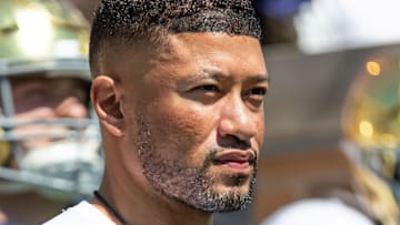 Notre Dame Fighting Irish head coach Marcus Freeman waits to run onto the field