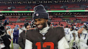 Cleveland Browns quarterback Shedeur Sanders (12) shakes hands with Tennessee Titans quarterback Cam Ward (1) after the Titans beat the Browns on Dec. 7, 2025, in Cleveland.