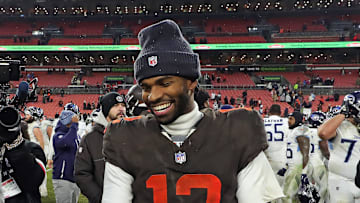 Cleveland Browns quarterback Shedeur Sanders (12) shakes hands with Tennessee Titans quarterback Cam Ward (1) after the Titans beat the Browns on Dec. 7, 2025, in Cleveland.