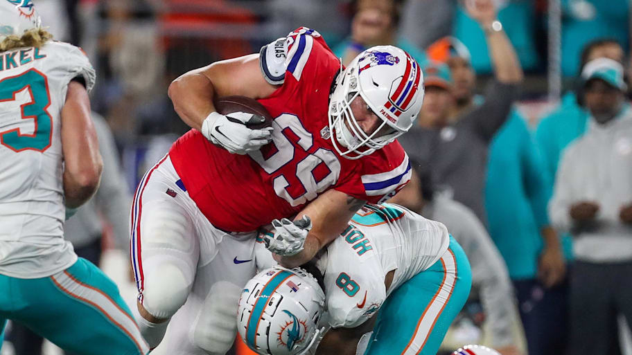 Sep 17, 2023; Foxborough, Massachusetts, USA; New England Patriots guard Cole Strange (69) runs the ball during the second half against the Miami Dolphins at Gillette Stadium. Mandatory Credit: Paul Rutherford-Imagn Images | Paul Rutherford-Imagn Images