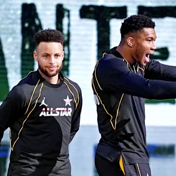Stephen Curry and Giannis Antetokounmpo at the 2021 NBA All-Star game. 