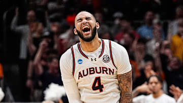 Auburn forward Johni Broome (4) celebrates a play against Michigan State during the second half of the Elite Eight round of NCAA tournament at State Farm Arena in Atlanta, Ga. on Sunday, March 30, 2025.