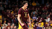 Nov 25, 2024; Minneapolis, Minnesota, USA; Central Michigan Chippewas forward Ugnius Jarusevicius (21) celebrates his three-point basket against the Minnesota Golden Gophers during the first half at Williams Arena.