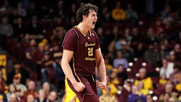 Nov 25, 2024; Minneapolis, Minnesota, USA; Central Michigan Chippewas forward Ugnius Jarusevicius (21) celebrates his three-point basket against the Minnesota Golden Gophers during the first half at Williams Arena.
