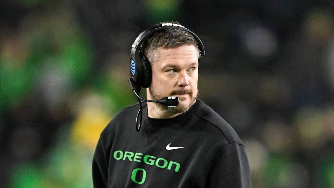 Dec 20, 2025; Eugene, OR, USA;  Oregon Ducks head coach Dan Lanning looks on during the fourth quarter against the James Madison Dukes at Autzen Stadium. Mandatory Credit: Craig Strobeck-Imagn Images