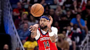Oct 23, 2024; New Orleans, Louisiana, USA;  New Orleans Pelicans forward Brandon Ingram (14) passes the ball across court against the Chicago Bulls during the second half at Smoothie King Center.
