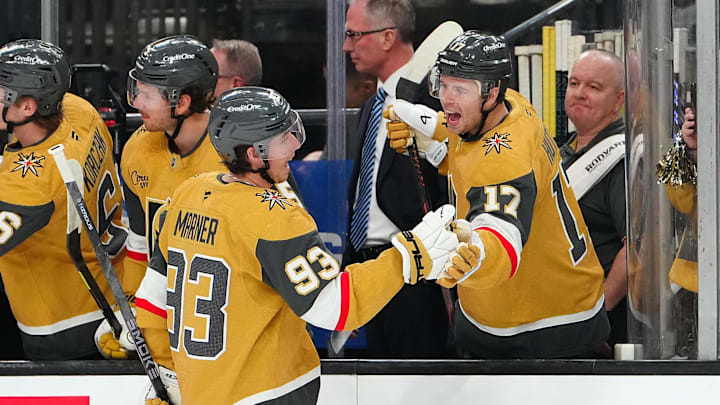Feb 5, 2026; Las Vegas, Nevada, USA; Vegas Golden Knights right wing Mitch Marner (93) celebrates with defenseman Ben Hutton (17) after scoring a goal against the Los Angeles Kings during the first period at T-Mobile Arena. Mandatory Credit: Stephen R. Sylvanie-Imagn Images