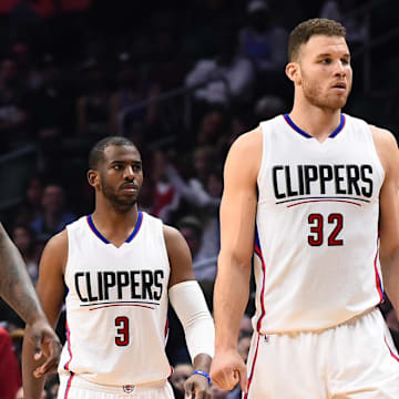 Mar 26, 2017; Los Angeles, CA, USA;  Los Angeles Clippers center DeAndre Jordan (6), guard Chris Paul (3) and forward Blake Griffin (32) come off the bench in the fourth quarter of the game against the Sacramento Kings at Staples Center. Kings won 98-97. Mandatory Credit: Jayne Kamin-Oncea-Imagn Images