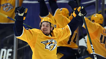 May 8, 2021; Nashville, Tennessee, USA; Nashville Predators left wing Erik Haula (56) celebrates after an empty net goal during the third period against the Carolina Hurricanes at Bridgestone Arena. Mandatory Credit: Christopher Hanewinckel-Imagn Images