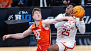 Mar 14, 2025; Indianapolis, IN, USA; Maryland Terrapins center Derik Queen (25) shoots the ball while Illinois Fighting Illini guard Kasparas Jakucionis (32) defends in the second half at Gainbridge Fieldhouse. Mandatory Credit: Trevor Ruszkowski-Imagn Images