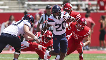 Sep 8, 2018; Houston, TX, USA; Arizona Wildcats running back Darrius Smith (20) runs with the ball during the fourth quarter against the Houston Cougars at TDECU Stadium. Mandatory Credit: Troy Taormina-Imagn Images