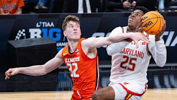 Mar 14, 2025; Indianapolis, IN, USA; Maryland Terrapins center Derik Queen (25) shoots the ball while Illinois Fighting Illini guard Kasparas Jakucionis (32) defends in the second half at Gainbridge Fieldhouse. Mandatory Credit: Trevor Ruszkowski-Imagn Images