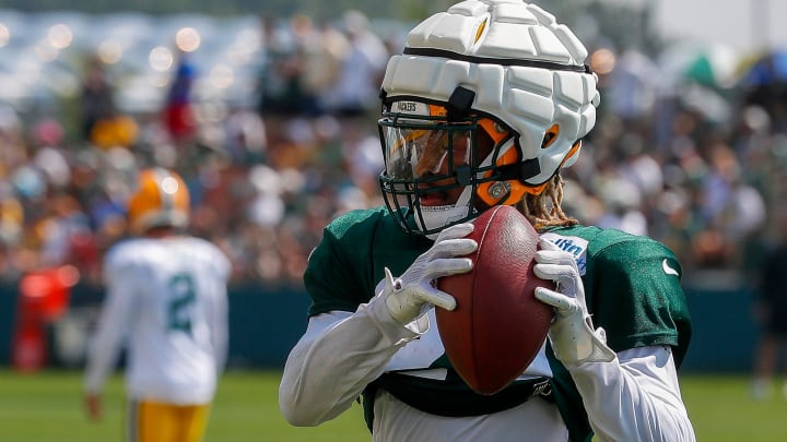 Green Bay Packers safety Xavier McKinney catches a pass during drills at Packers training camp.