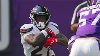 Aug 9, 2025; Minneapolis, Minnesota, USA; Houston Texans running back Woody Marks (27) runs with the ball against the Minnesota Vikings in the third quarter at U.S. Bank Stadium. Mandatory Credit: Brad Rempel-Imagn Images