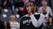 Mar 7, 2025; Sacramento, California, USA; San Antonio Spurs guard De'Aaron Fox (4) looks on during pregame warm ups before the game against the Sacramento Kings at Golden 1 Center.