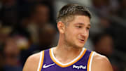 Nov 29, 2025; Phoenix, Arizona, USA; Phoenix Suns guard Grayson Allen (8) with head coach Jordan Ott against the Denver Nuggets at the Mortgage Matchup Center. Mandatory Credit: Mark J. Rebilas-Imagn Images