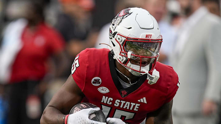 Sep 7, 2024; Charlotte, North Carolina, USA; North Carolina State Wolfpack tight end Justin Joly (15) during pregame activities against the Tennessee Volunteers at the Dukes Mayo Classic at Bank of America Stadium. Mandatory Credit: Jim Dedmon-Imagn Images