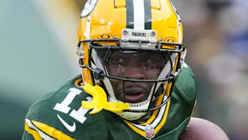 Green Bay Packers receiver Jayden Reed (11) runs for yards against the Chicago Bears last season.