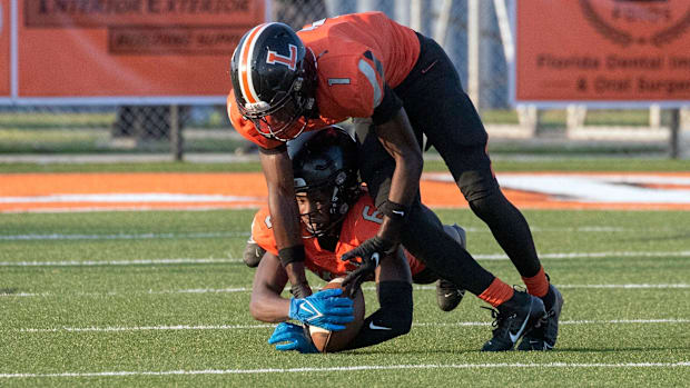 Lakeland's Keon Young (1) and Ahmaad Watts (6) 